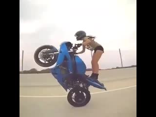 girl rocking on a motorcycle